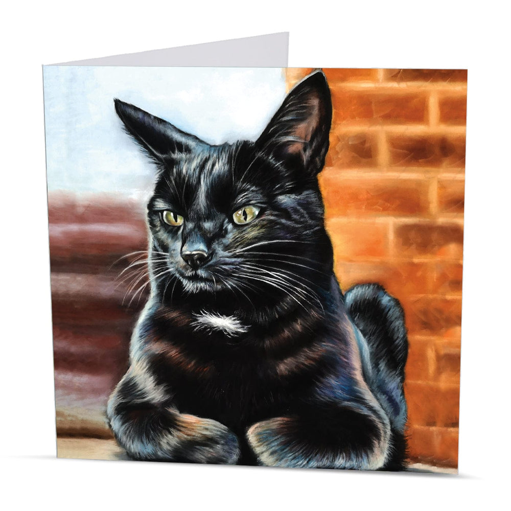 Greeting card with a black cat illustration with a brick wall background