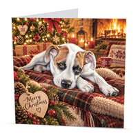 Square 15 x 15 cm puppy Christmas card featuring original festive dog artwork by Irisha, printed on premium 350 gsm textured cardstock.