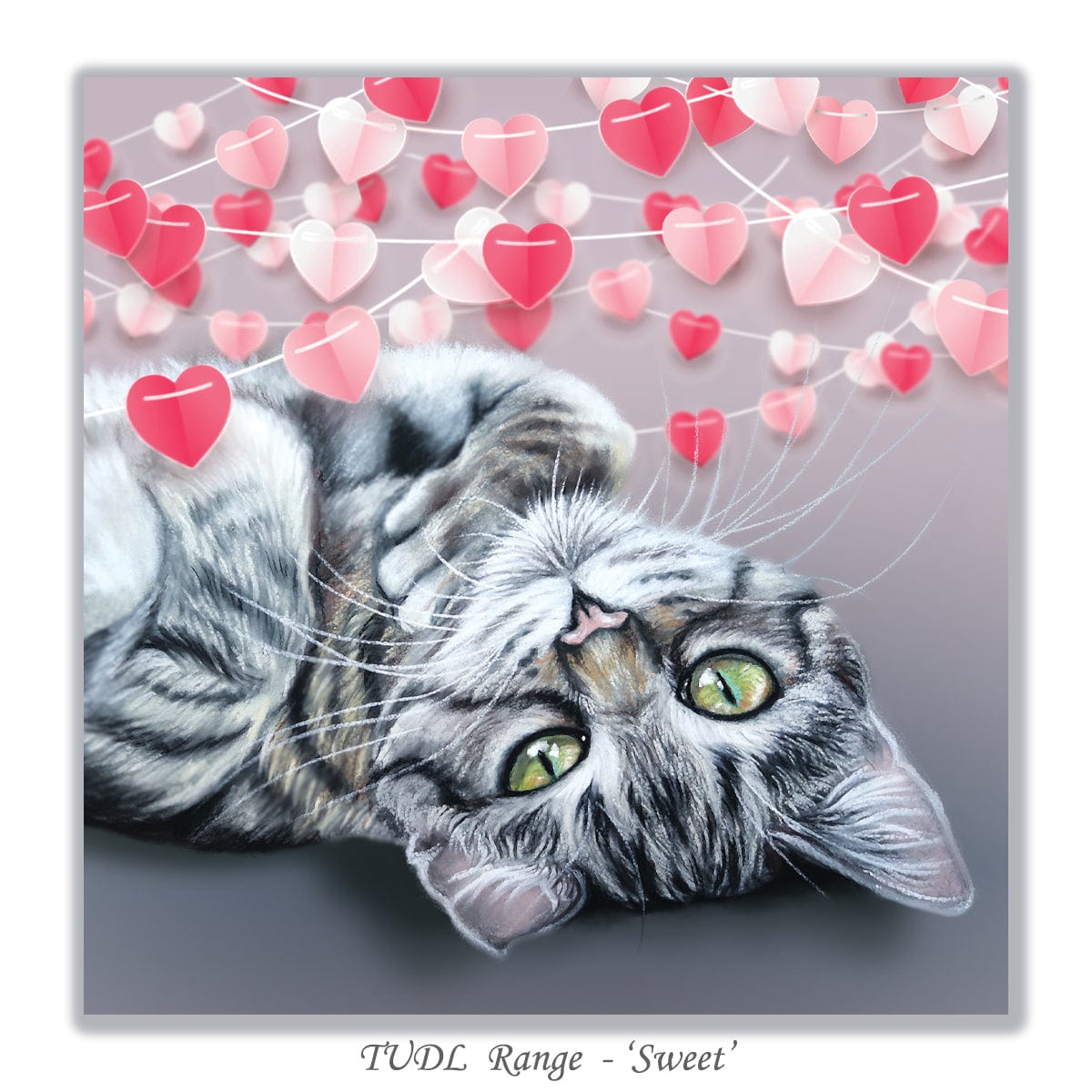 Sweet kitten lover greeting card showing a playful tabby kitten resting beneath heart bunting, perfect for Valentine’s or any occasion.