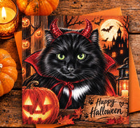Black cat Halloween card featuring a vampire cat with red cape, devil horns and glowing pumpkins