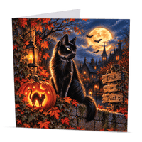 Trick or Treat black cat card with moonlit Halloween scene and jack-o'-lanterns