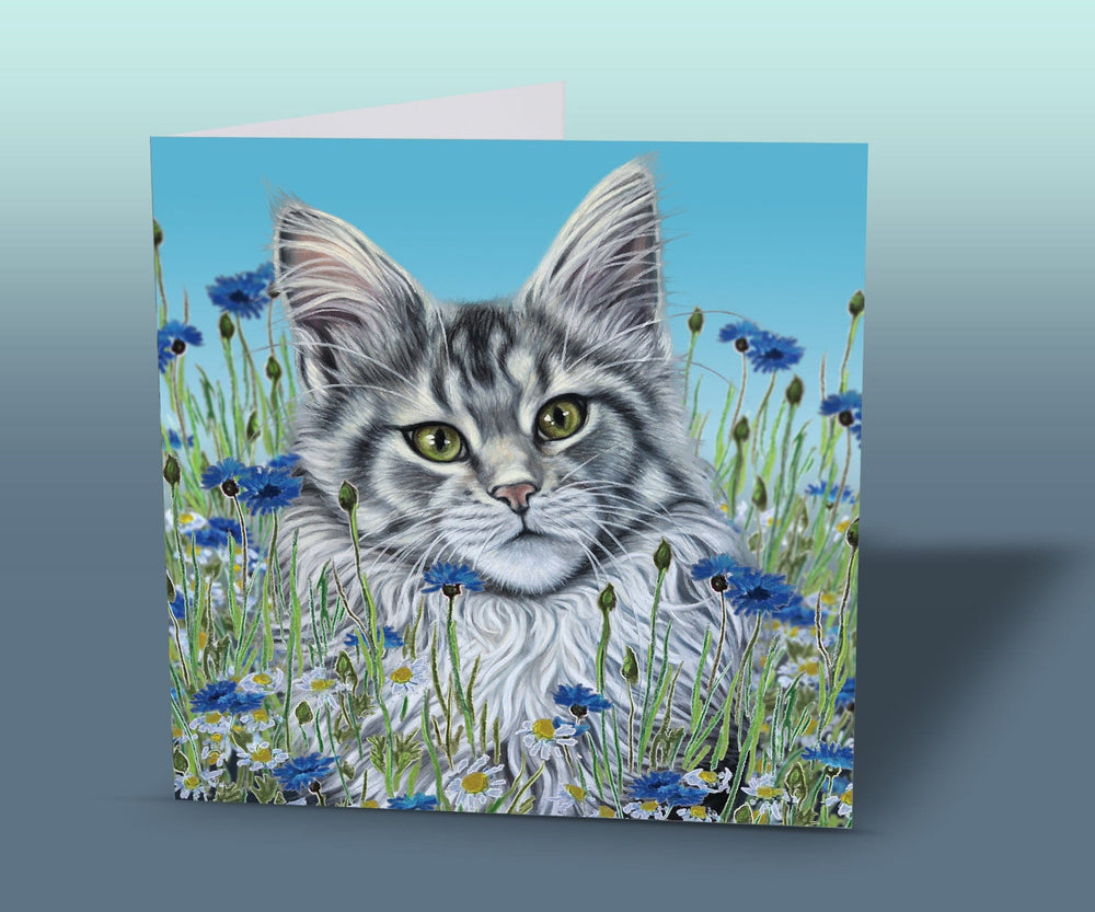 greeting card with maine coon cat among the blue flowers
