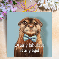 Funny otter birthday card featuring an illustrated otter in a blue bow tie with the caption “Otterly fabulous at any age!”